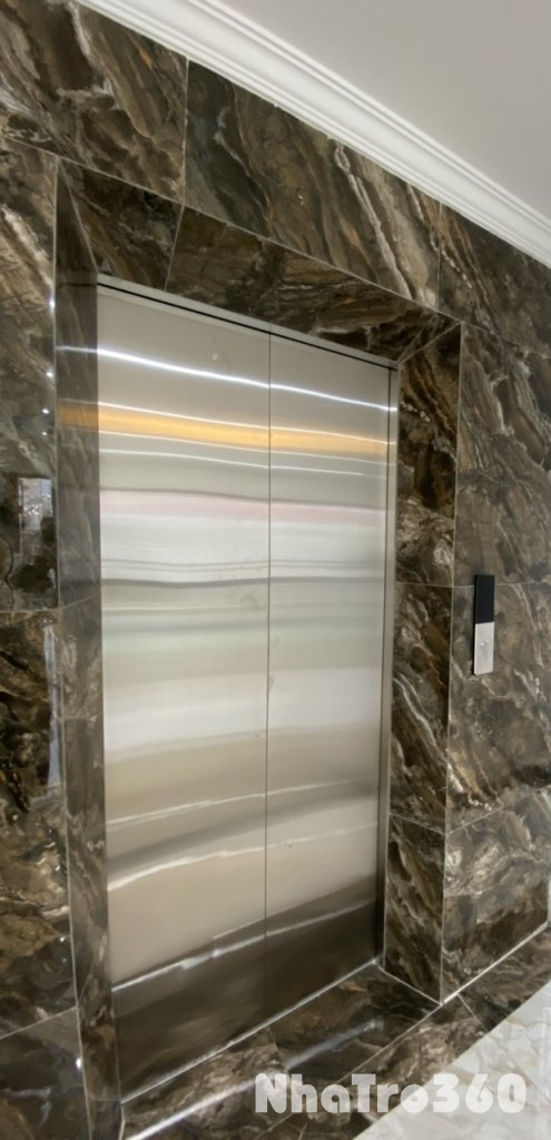 Cho thuê nhà mới, căn góc, thang máy, 95m2_ 5T; vỉa hè, Đào Tấn-32 Tr