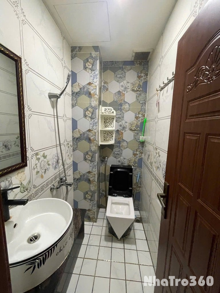 Cho thuê nhà nguyên căn hẻm thông xe hơi p15 tân