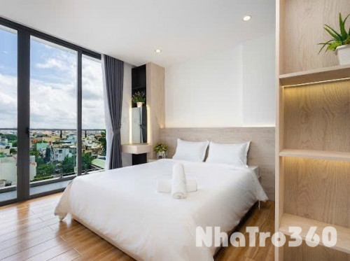 CHO THUÊ PHÒNG TRỌ CÓ BAN CÔNG NGAY NHÀ GA T3, QTB