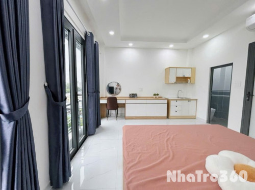 Studio ban công, của kính, full nt, 40m2 siêu rộng, 5p qua q1,4,8.