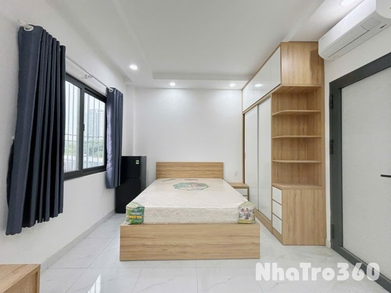 Studio ban công, của kính, full nt, 40m2 siêu rộng, 5p qua q1,4,8.
