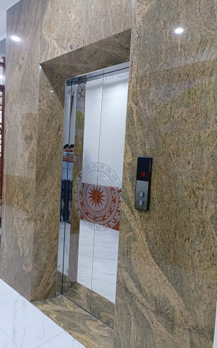 Cho thuê nhà mới, căn góc, Tôn Đức Thắng, thang máy; vỉa hè 104m2* 5T- 31 Tr