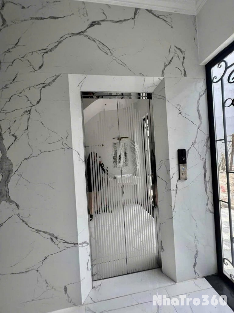Cho thuê nhà mới, thang máy, 100m2_ 5T; vỉa hè, Nguyễn Khánh Toàn-31 Tr